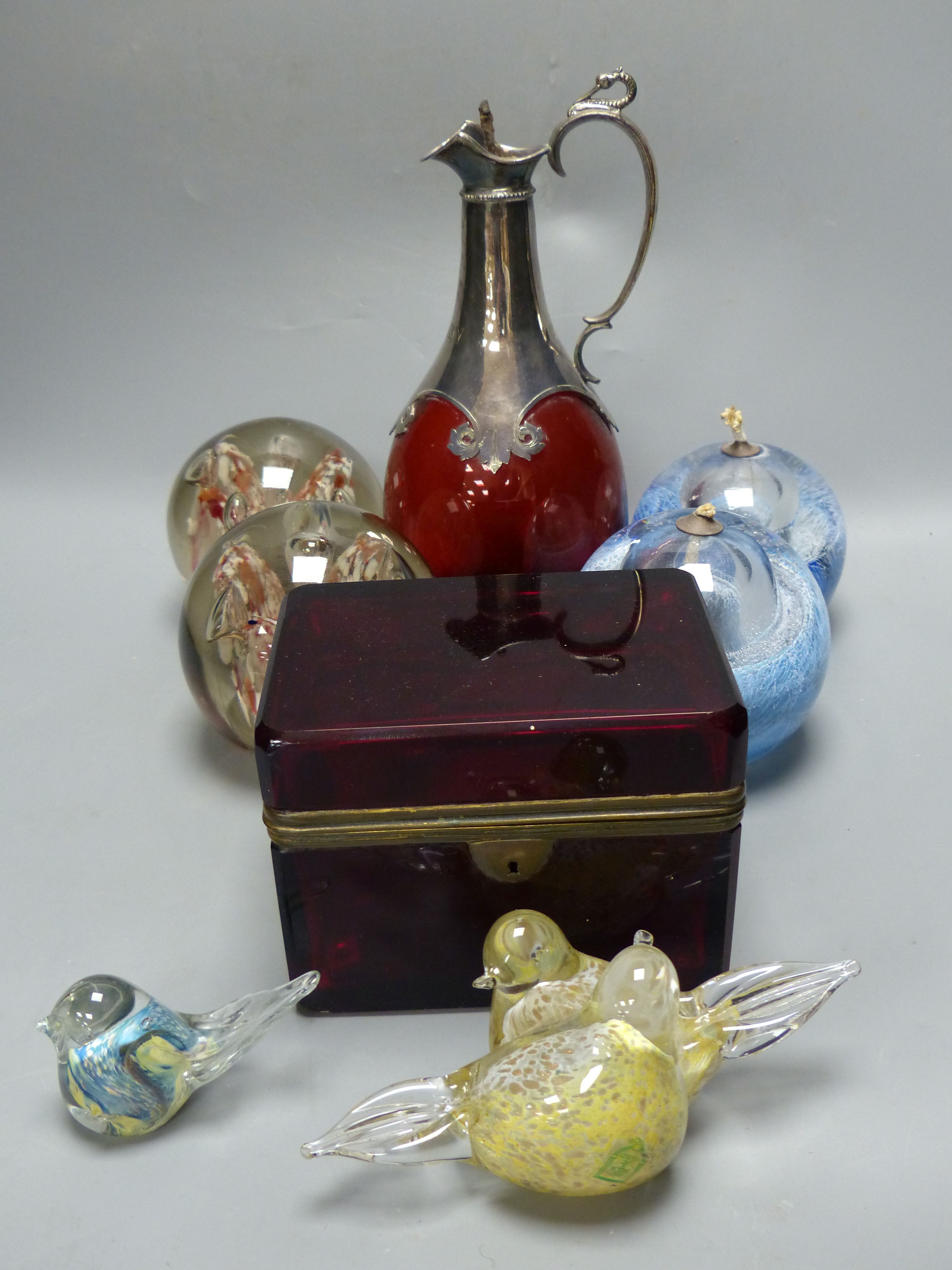 A late 19th century Bohemian ruby glass casket, a Victorian ruby glass and electroplate claret jug, a pair of glass candle holders, sim